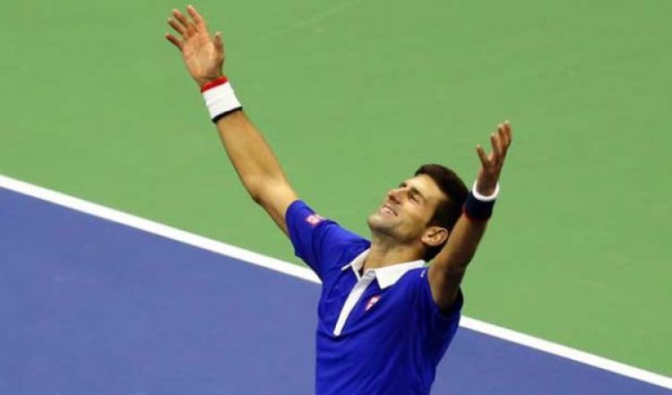 O tenista sérvio Novak Djokovic comemora vitória sobre Roger Federer no último domingo (13) no U.S. Open, em Nova York (Foto: Maddie Meyer / Getty Images / AFP Photo)